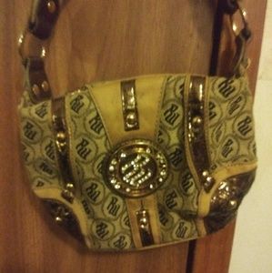 A Brown/gold RU purse